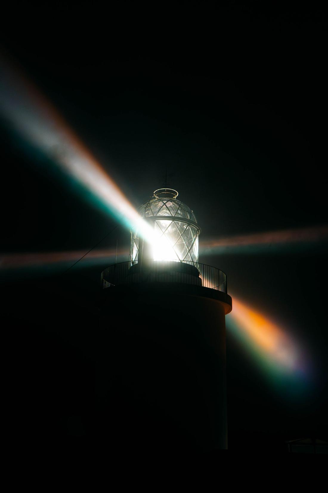 Lighthouse beam at night