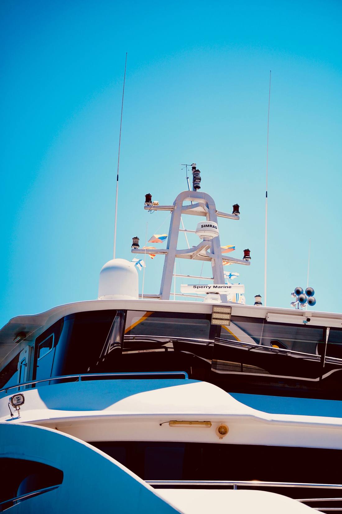 Superyacht mast, radar and flags